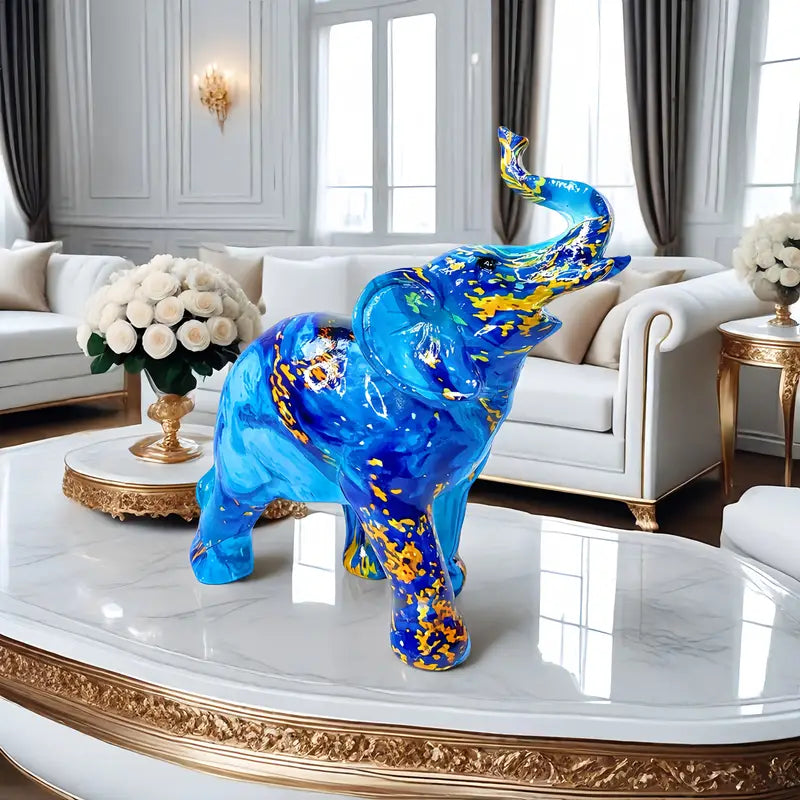 Elegante estatua de elefante azul de resina con detalles dorados