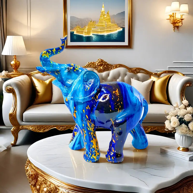 Elegante estatua de elefante azul de resina con detalles dorados