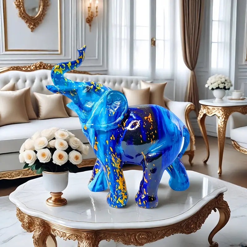 Elegante estatua de elefante azul de resina con detalles dorados