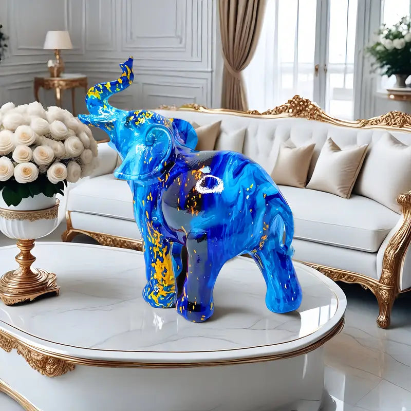 Elegante estatua de elefante azul de resina con detalles dorados